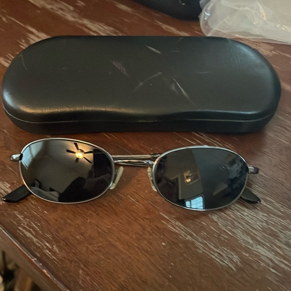 Caribbean Sun men’s sunglasses with case.